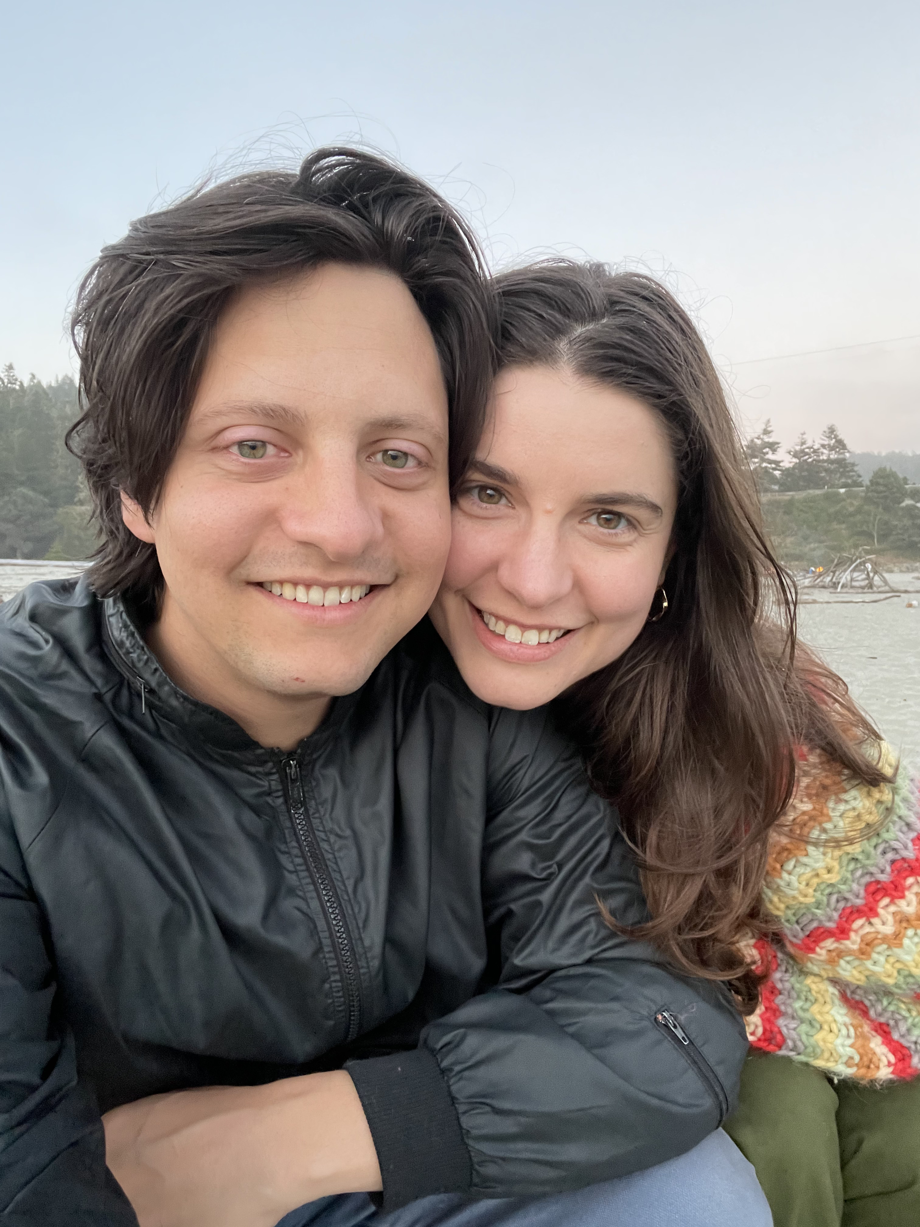 Picture of Maggie and Brian hugging, overlooking a city